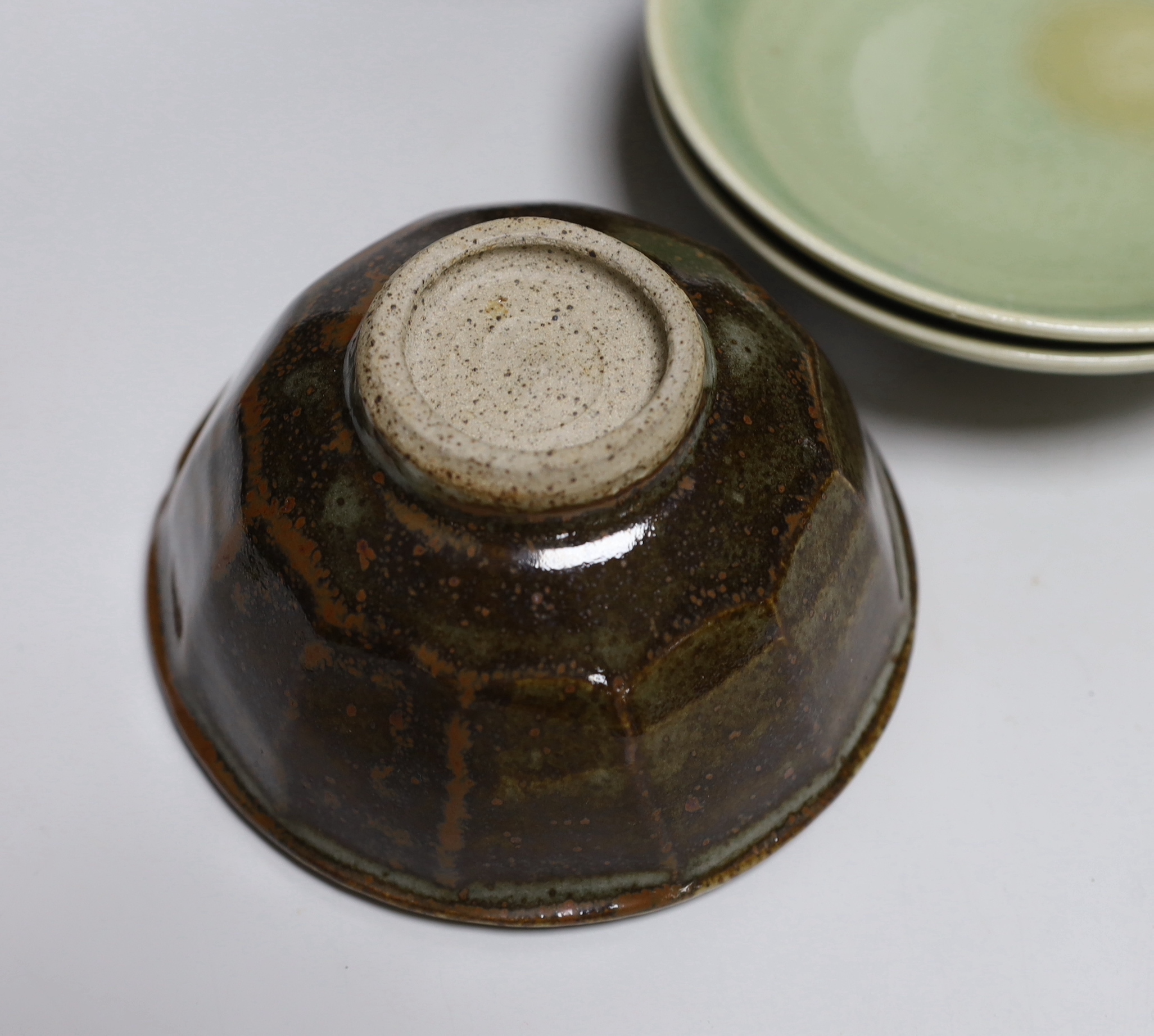 Two green glazed dishes by Jack Kenny, two dark glazed vases, a similar jug and a small bowl, tallest 26cm high